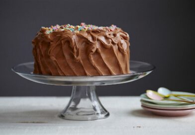 brown cake on clear glass cake stand